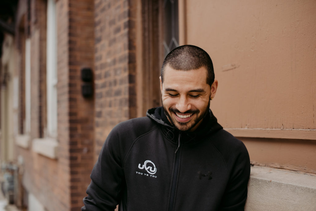 UVU personal trainer Kenny Caceros laughing