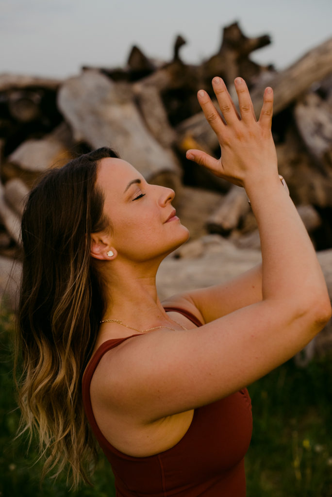 ottawa yoga teachers with hands in prayer and eyes closed
