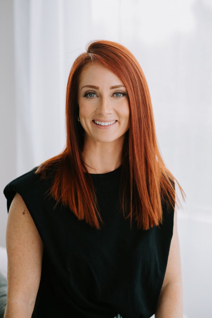 headshot of woman with red hair