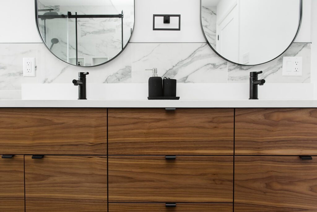black and wood details in modern bathroom renovation